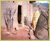 Homestead entrance showing typical mud-architecture and shrines at Koutammakou, Land of the Batammarimba (UNESCO world heritage site, Togo)